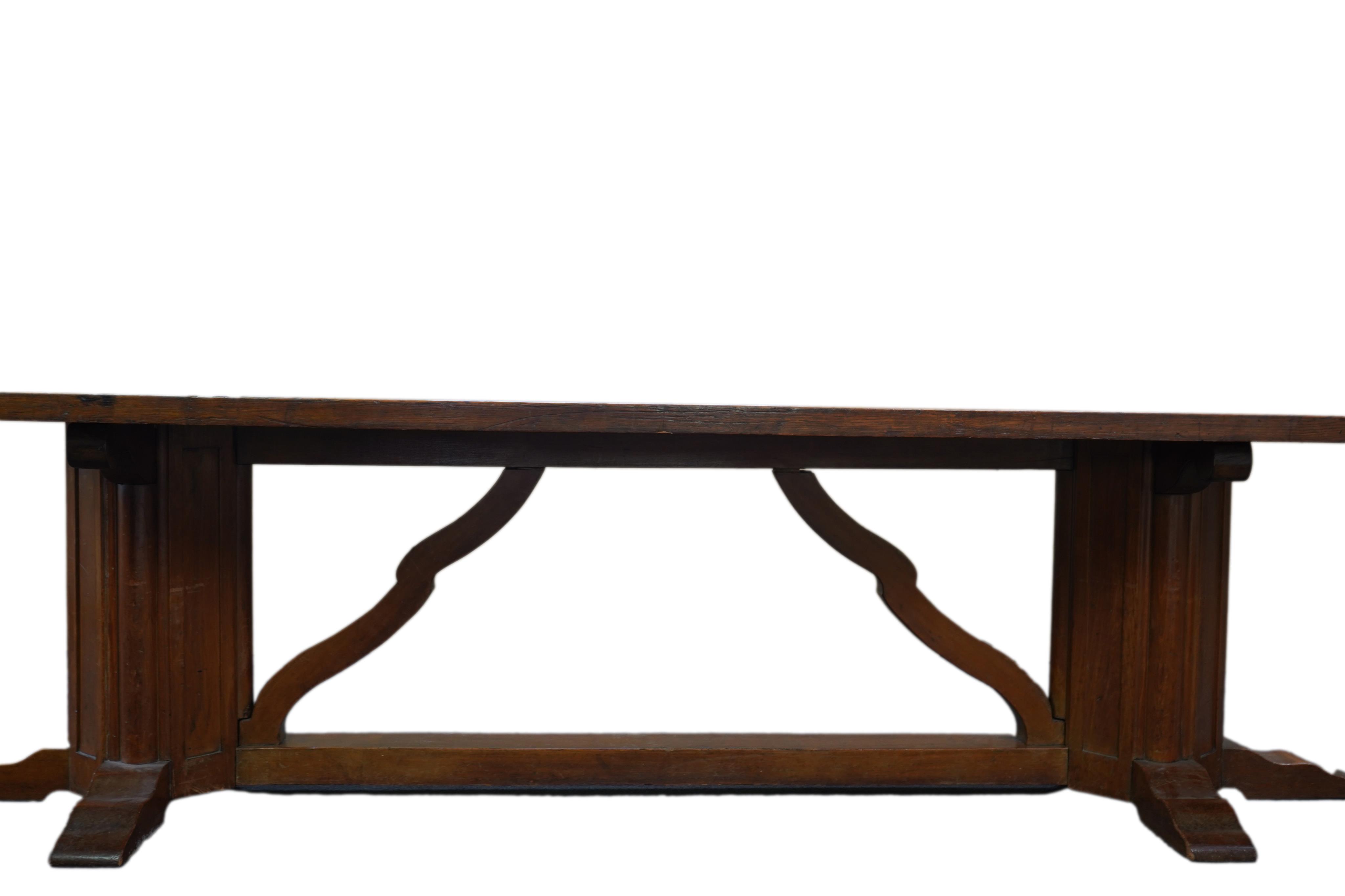 An Arts and Crafts oak refectory dining table